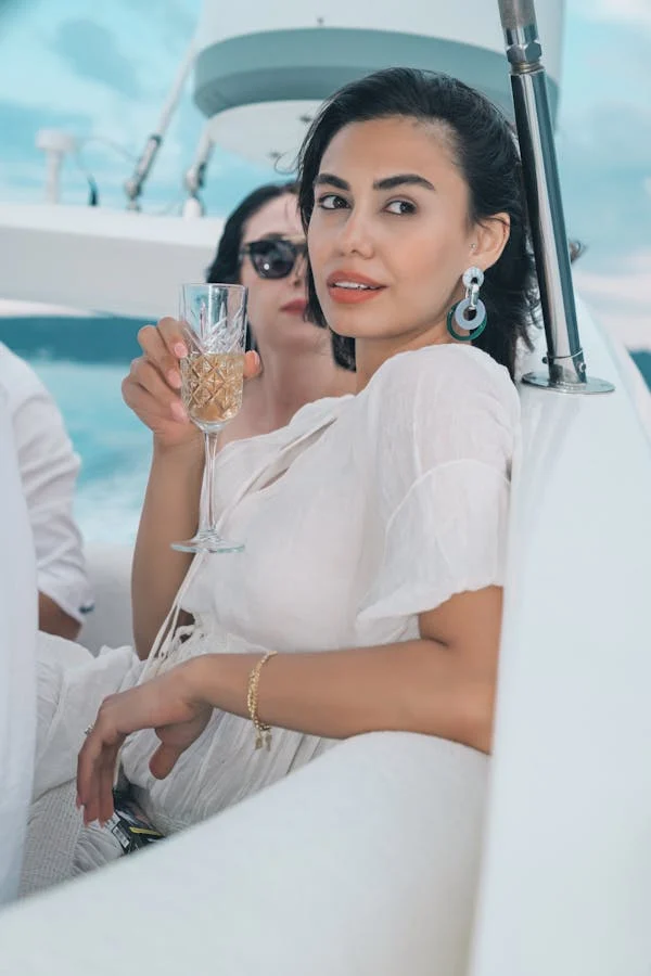 Woman Sipping Champagne on Boat