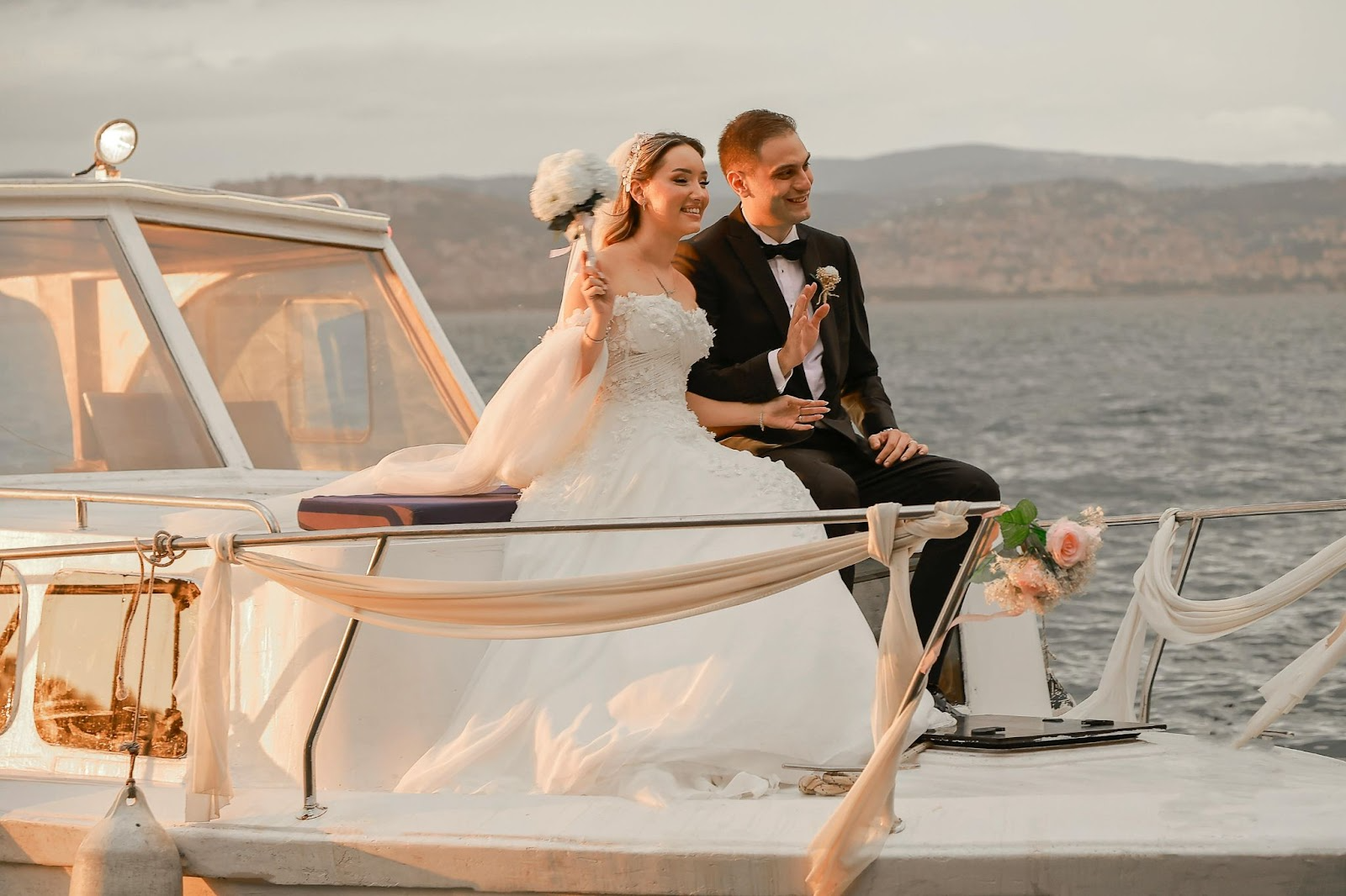 Freshly married couple on a yacht