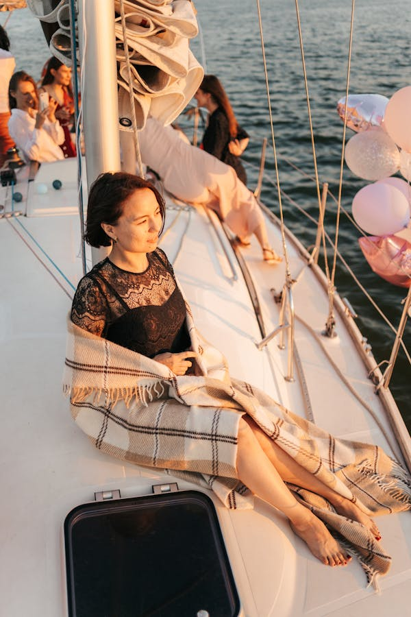 Woman on Boat at Sunset